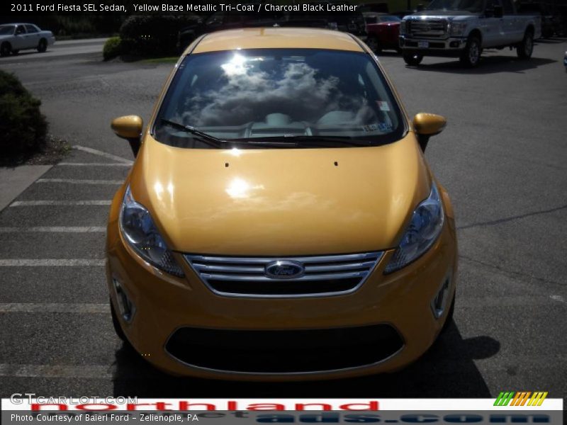 Yellow Blaze Metallic Tri-Coat / Charcoal Black Leather 2011 Ford Fiesta SEL Sedan