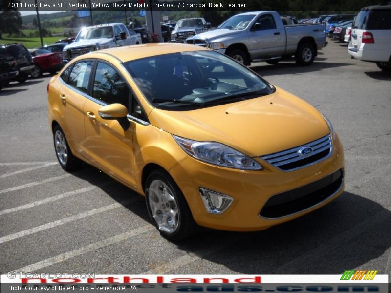 Yellow Blaze Metallic Tri-Coat / Charcoal Black Leather 2011 Ford Fiesta SEL Sedan
