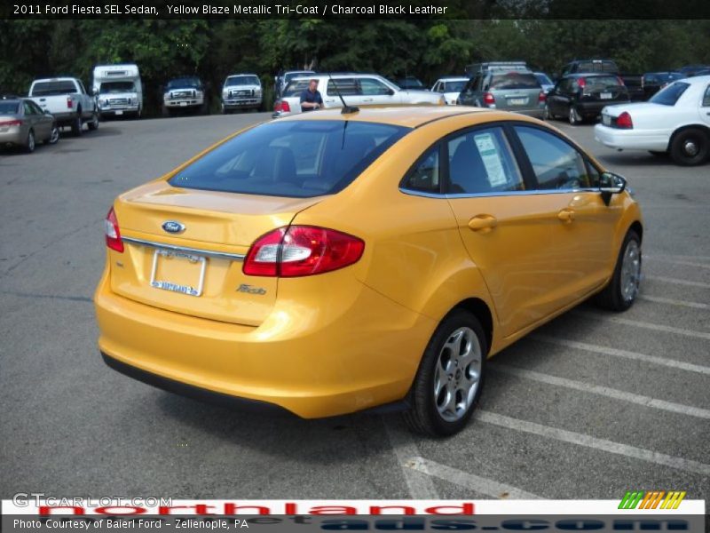 Yellow Blaze Metallic Tri-Coat / Charcoal Black Leather 2011 Ford Fiesta SEL Sedan