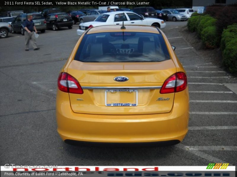 Yellow Blaze Metallic Tri-Coat / Charcoal Black Leather 2011 Ford Fiesta SEL Sedan