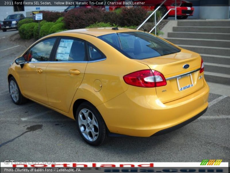 Yellow Blaze Metallic Tri-Coat / Charcoal Black Leather 2011 Ford Fiesta SEL Sedan