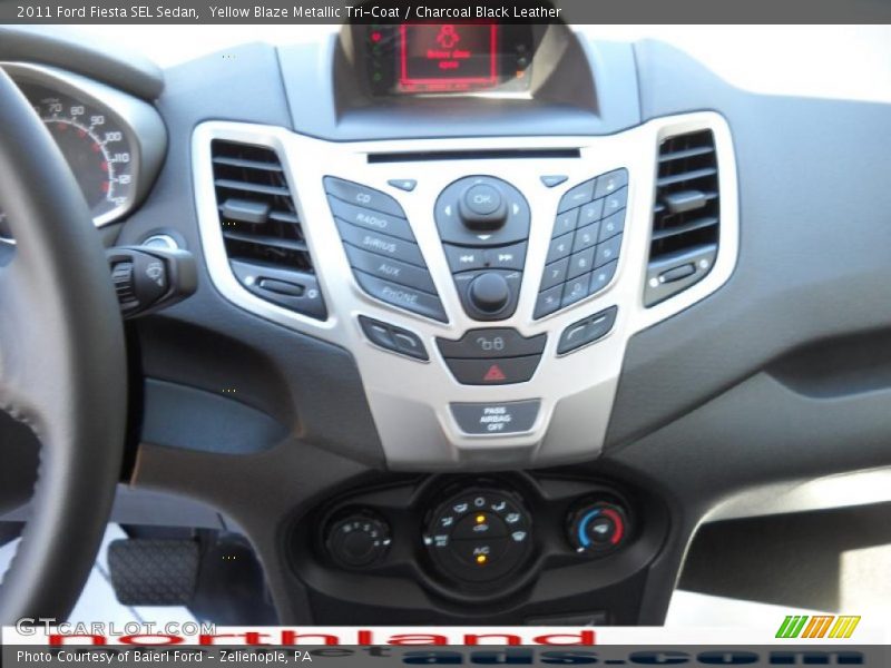 Yellow Blaze Metallic Tri-Coat / Charcoal Black Leather 2011 Ford Fiesta SEL Sedan