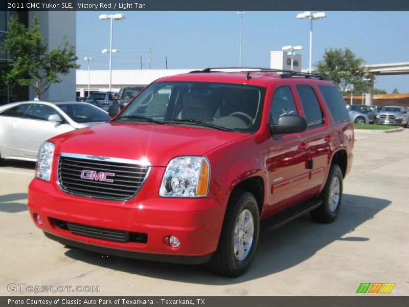 Victory Red / Light Tan 2011 GMC Yukon SLE