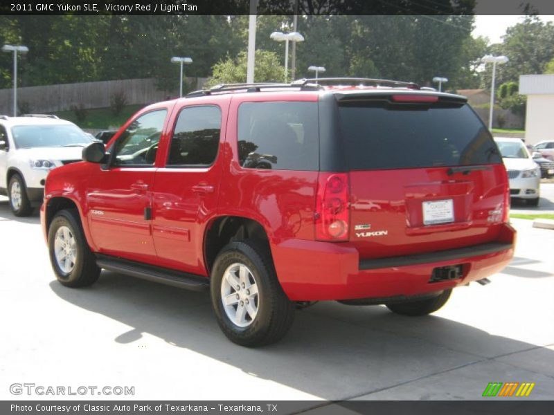 Victory Red / Light Tan 2011 GMC Yukon SLE