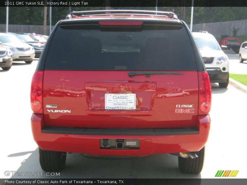 Victory Red / Light Tan 2011 GMC Yukon SLE