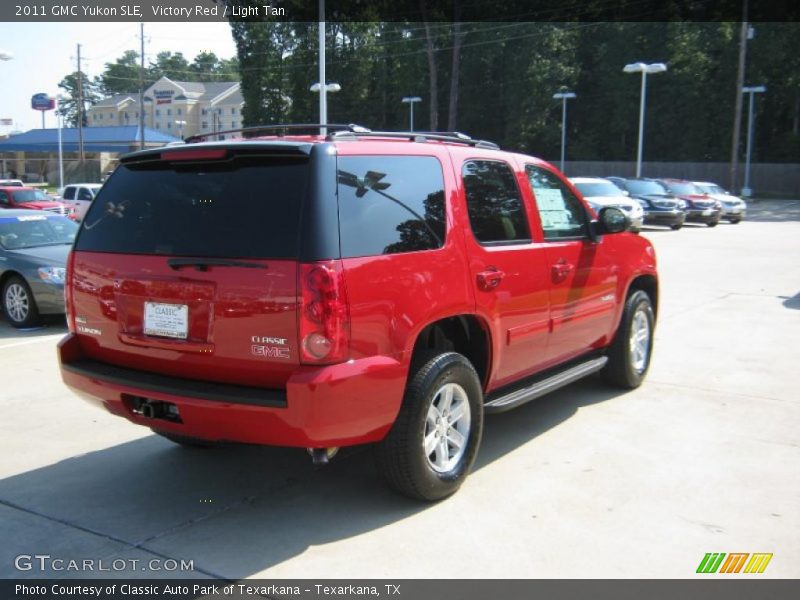 Victory Red / Light Tan 2011 GMC Yukon SLE