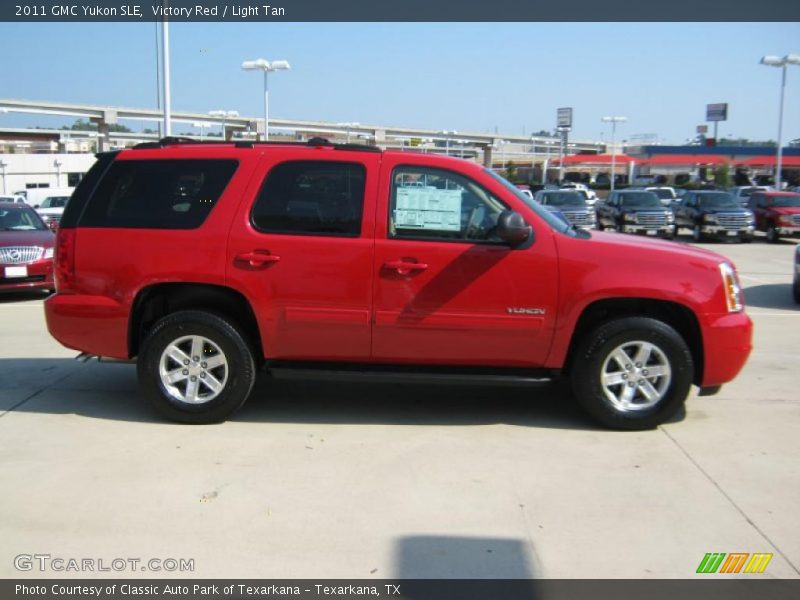 Victory Red / Light Tan 2011 GMC Yukon SLE