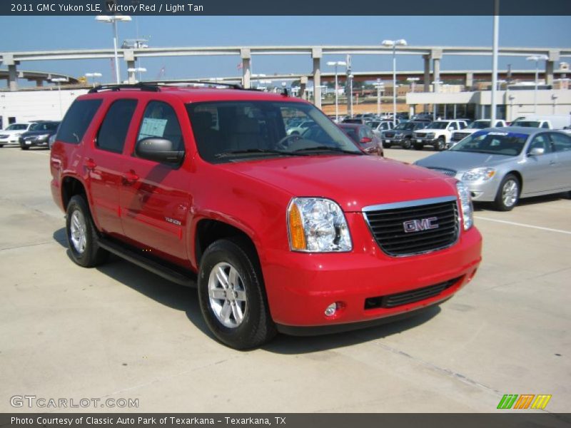 Victory Red / Light Tan 2011 GMC Yukon SLE