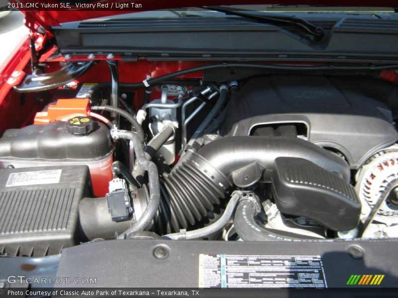 Victory Red / Light Tan 2011 GMC Yukon SLE