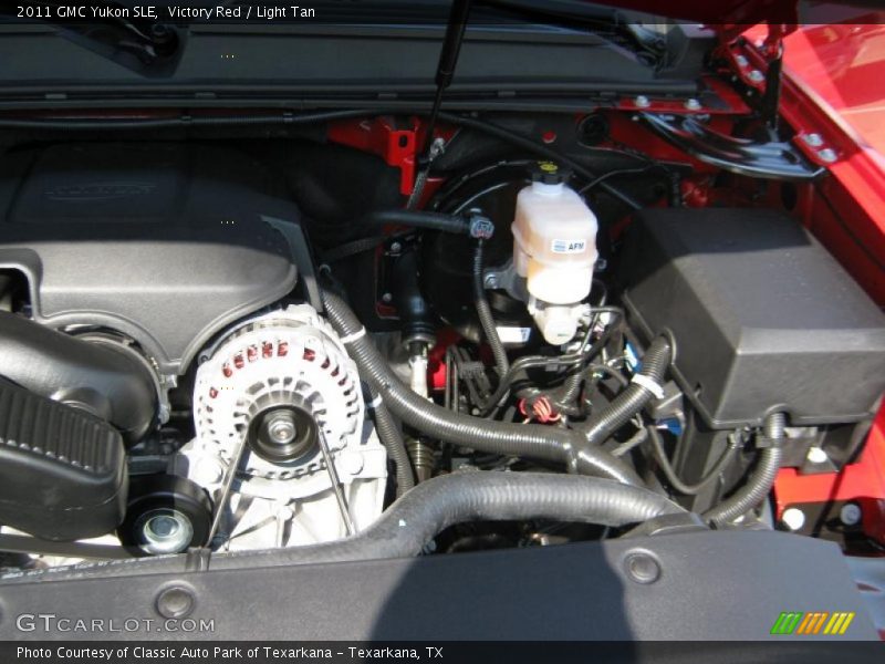 Victory Red / Light Tan 2011 GMC Yukon SLE