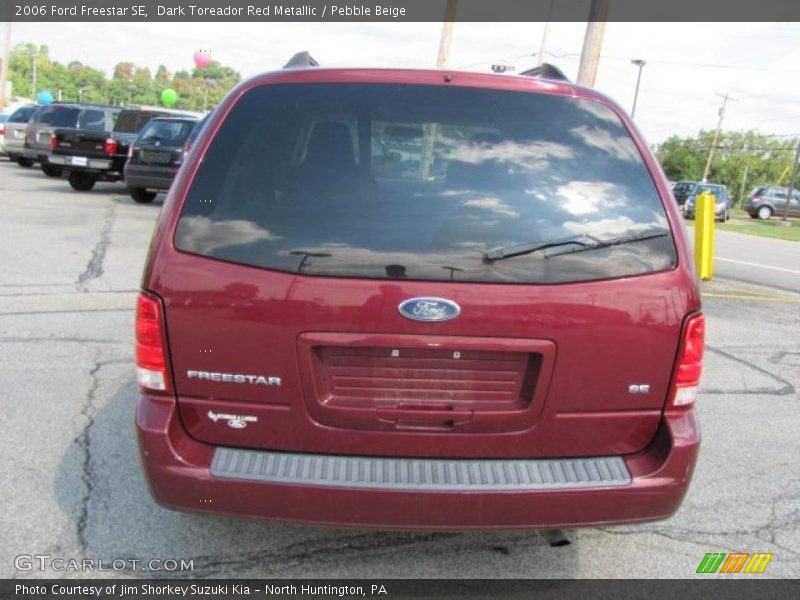 Dark Toreador Red Metallic / Pebble Beige 2006 Ford Freestar SE