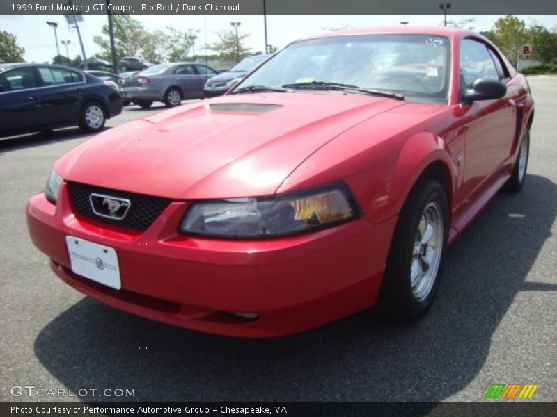 Rio Red / Dark Charcoal 1999 Ford Mustang GT Coupe