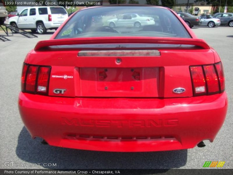 Rio Red / Dark Charcoal 1999 Ford Mustang GT Coupe