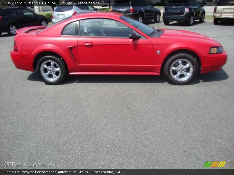 Rio Red / Dark Charcoal 1999 Ford Mustang GT Coupe