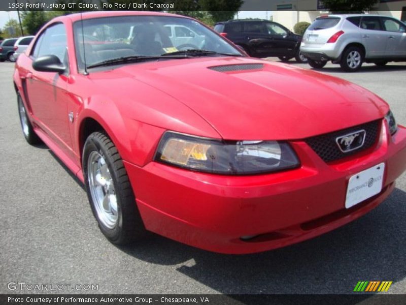 Rio Red / Dark Charcoal 1999 Ford Mustang GT Coupe