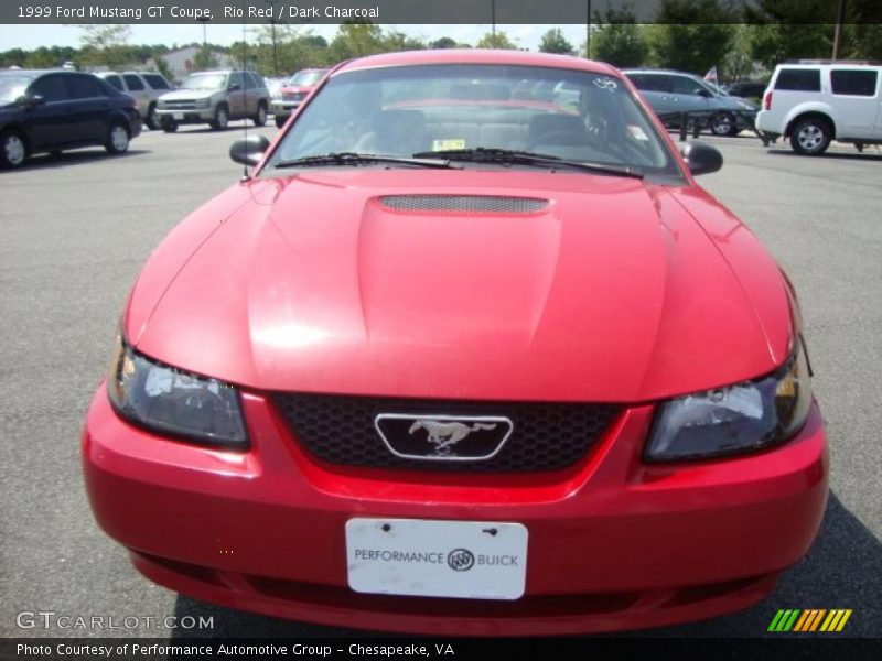 Rio Red / Dark Charcoal 1999 Ford Mustang GT Coupe