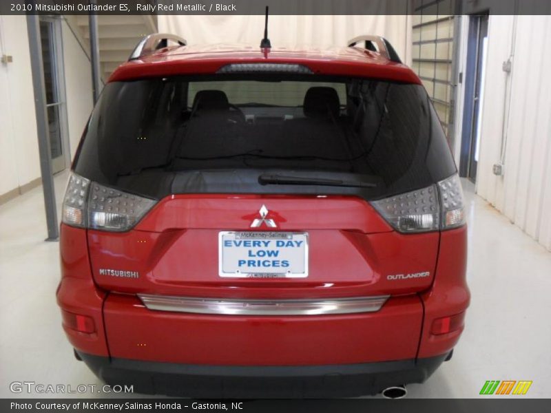 Rally Red Metallic / Black 2010 Mitsubishi Outlander ES