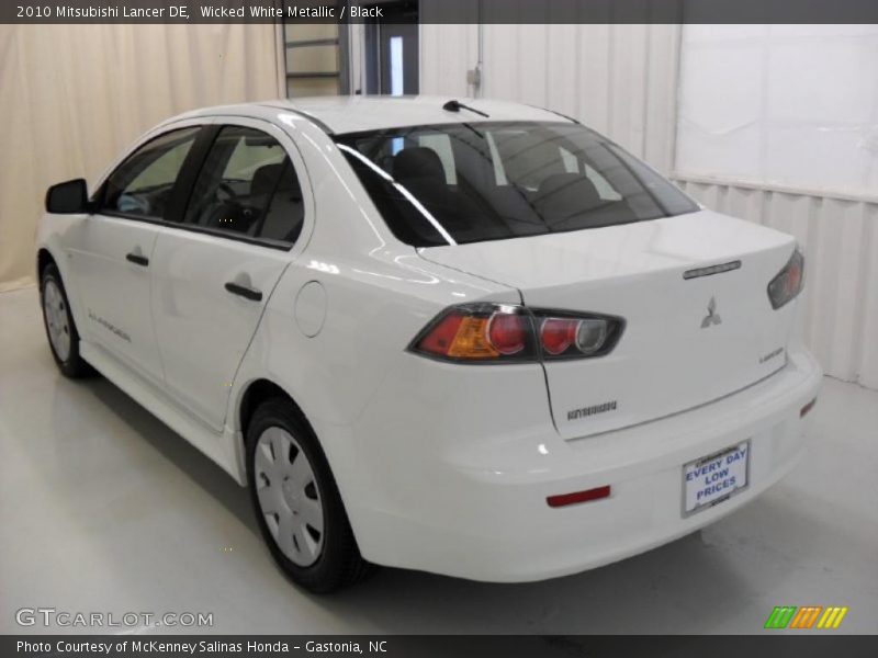 Wicked White Metallic / Black 2010 Mitsubishi Lancer DE