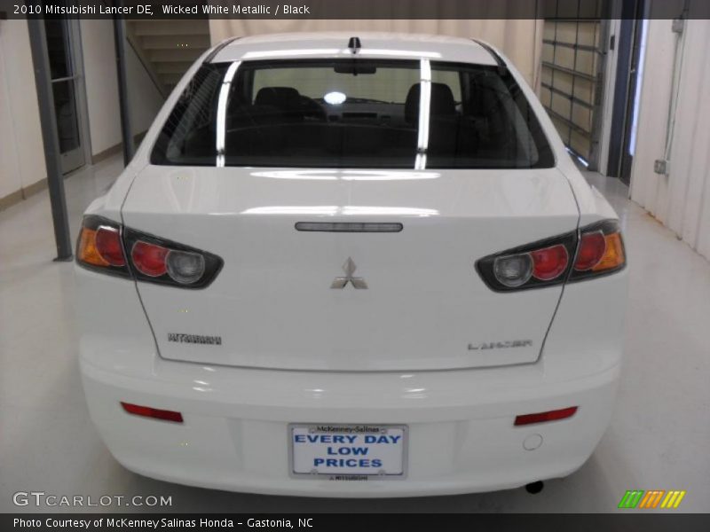 Wicked White Metallic / Black 2010 Mitsubishi Lancer DE