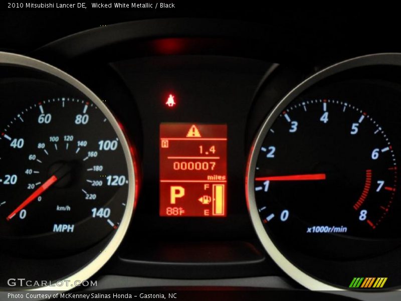 Wicked White Metallic / Black 2010 Mitsubishi Lancer DE