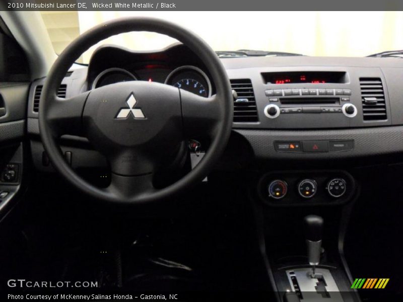 Wicked White Metallic / Black 2010 Mitsubishi Lancer DE