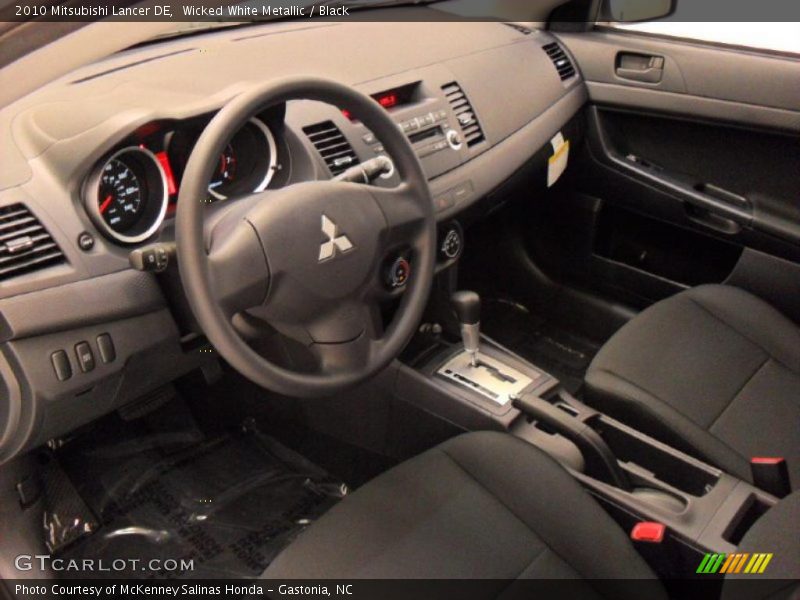 Wicked White Metallic / Black 2010 Mitsubishi Lancer DE