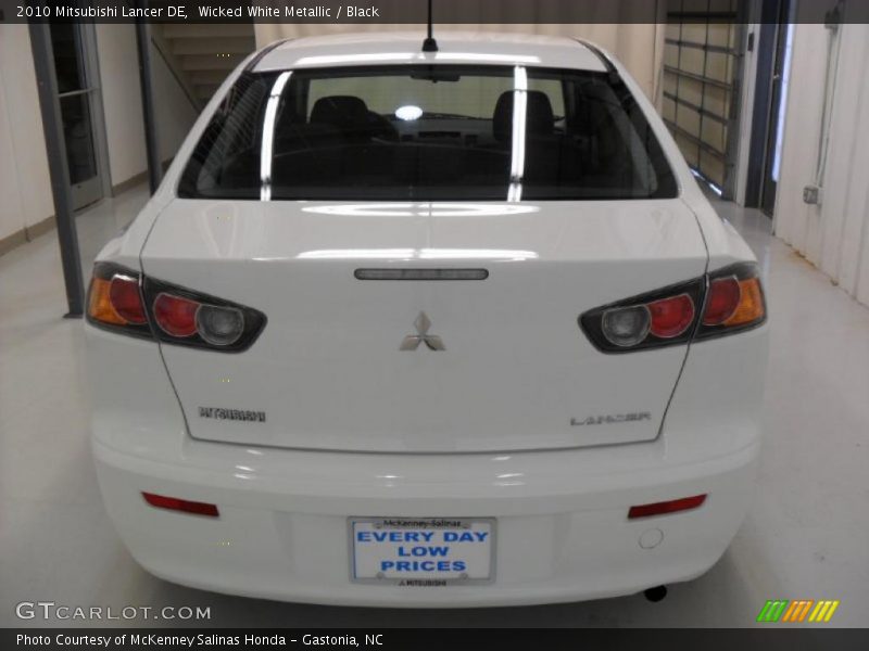 Wicked White Metallic / Black 2010 Mitsubishi Lancer DE