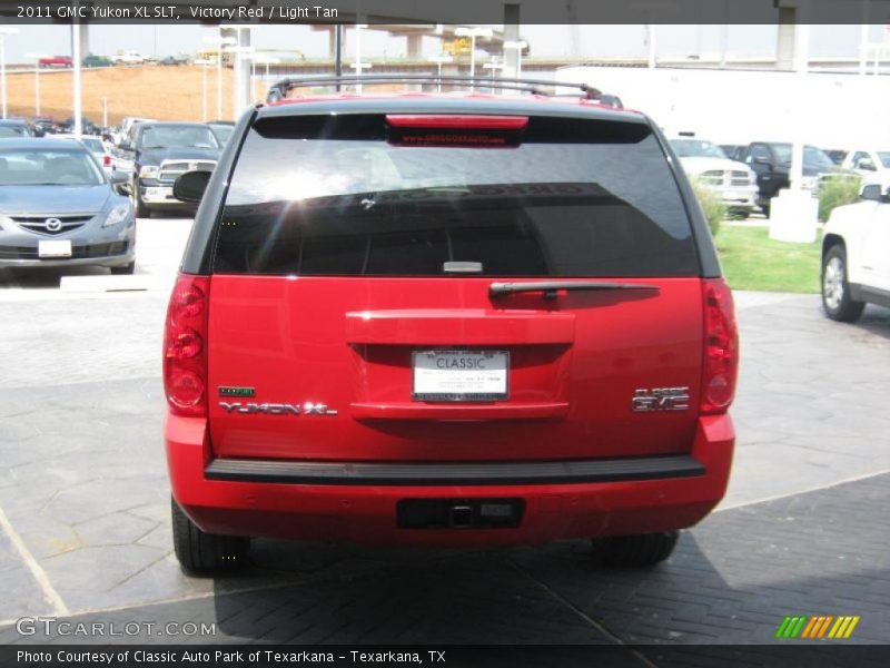 Victory Red / Light Tan 2011 GMC Yukon XL SLT