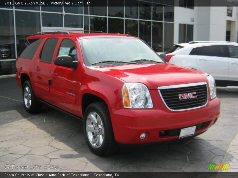 Victory Red / Light Tan 2011 GMC Yukon XL SLT