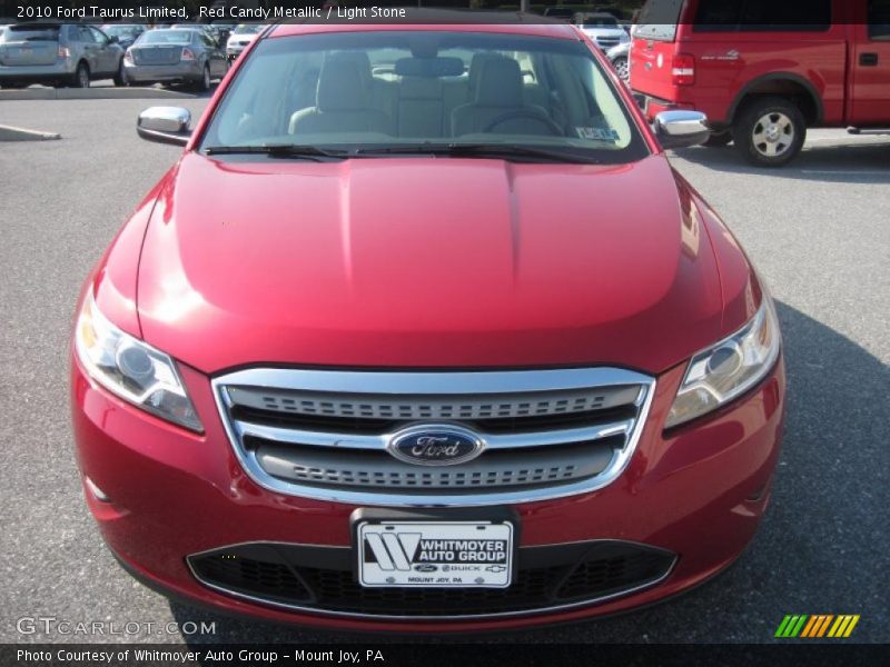 Red Candy Metallic / Light Stone 2010 Ford Taurus Limited