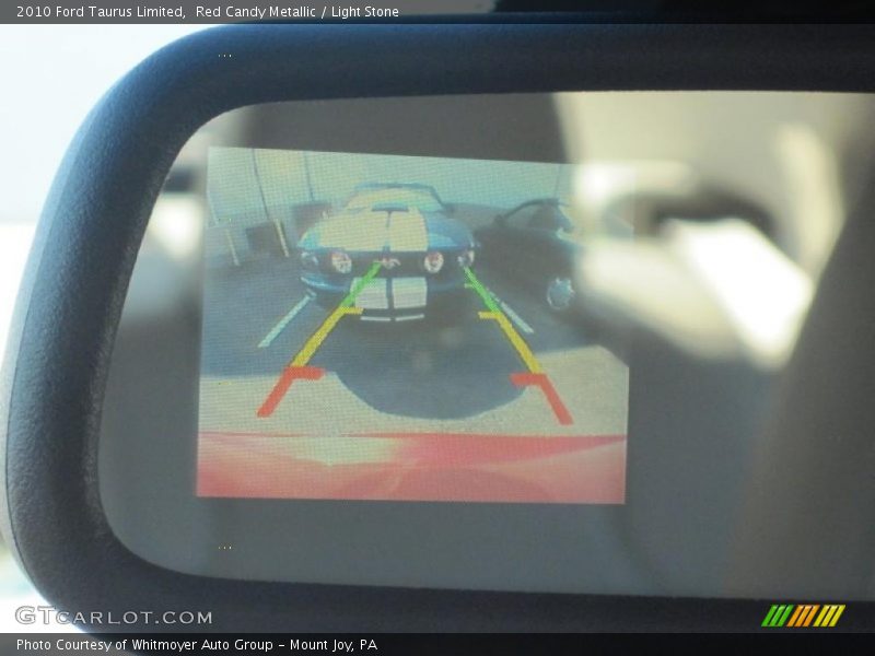 Red Candy Metallic / Light Stone 2010 Ford Taurus Limited