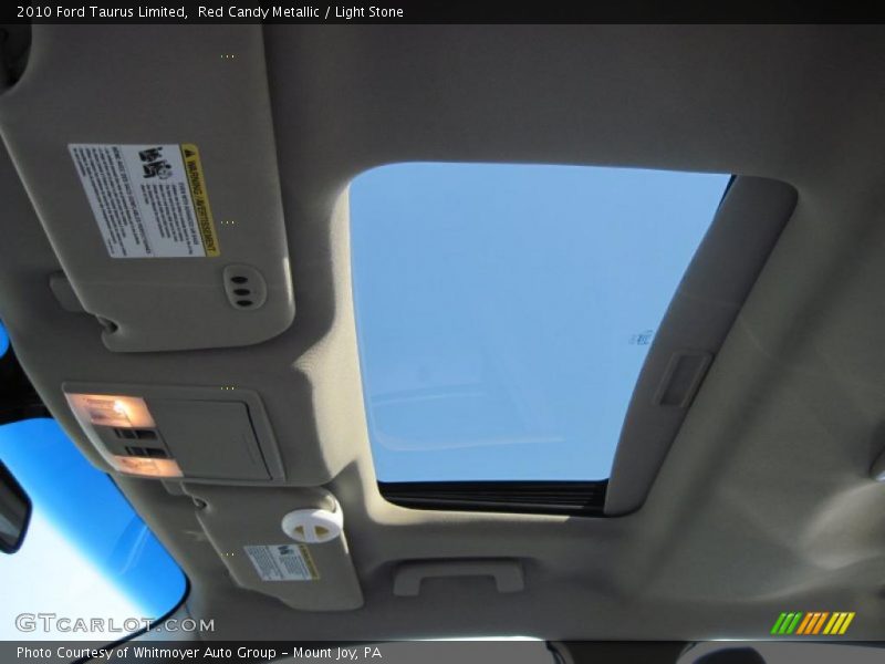 Red Candy Metallic / Light Stone 2010 Ford Taurus Limited