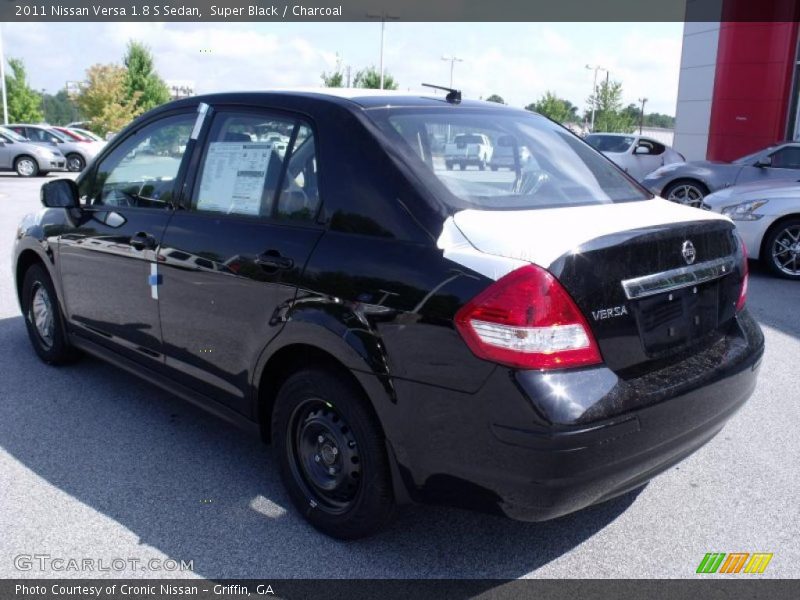 Super Black / Charcoal 2011 Nissan Versa 1.8 S Sedan