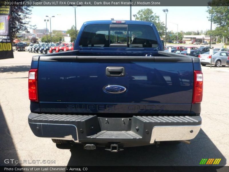 Dark Blue Pearl Metallic / Medium Stone 2010 Ford F250 Super Duty XLT FX4 Crew Cab 4x4