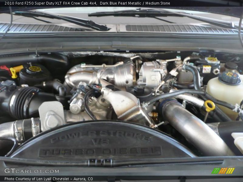 Dark Blue Pearl Metallic / Medium Stone 2010 Ford F250 Super Duty XLT FX4 Crew Cab 4x4