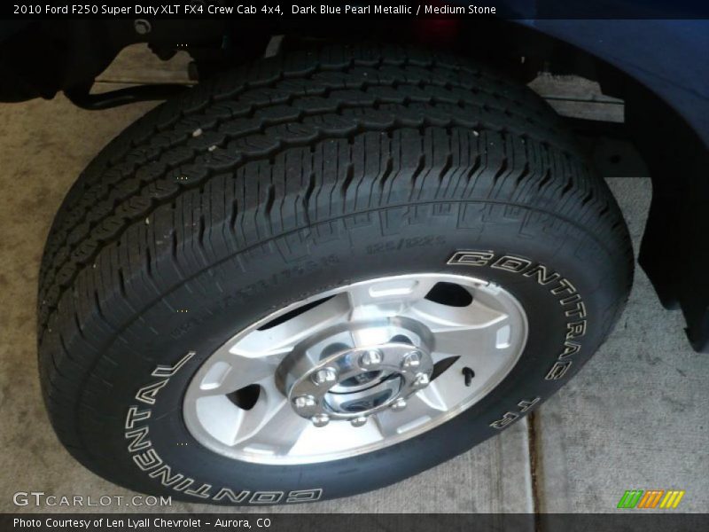 Dark Blue Pearl Metallic / Medium Stone 2010 Ford F250 Super Duty XLT FX4 Crew Cab 4x4
