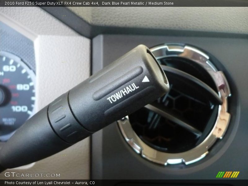 Dark Blue Pearl Metallic / Medium Stone 2010 Ford F250 Super Duty XLT FX4 Crew Cab 4x4