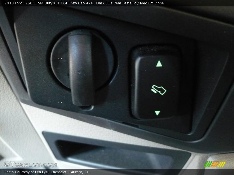 Dark Blue Pearl Metallic / Medium Stone 2010 Ford F250 Super Duty XLT FX4 Crew Cab 4x4