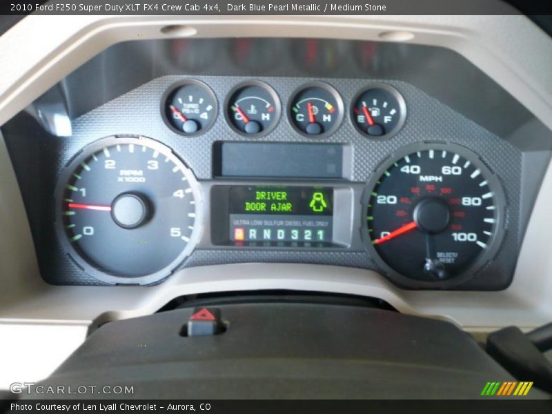 Dark Blue Pearl Metallic / Medium Stone 2010 Ford F250 Super Duty XLT FX4 Crew Cab 4x4