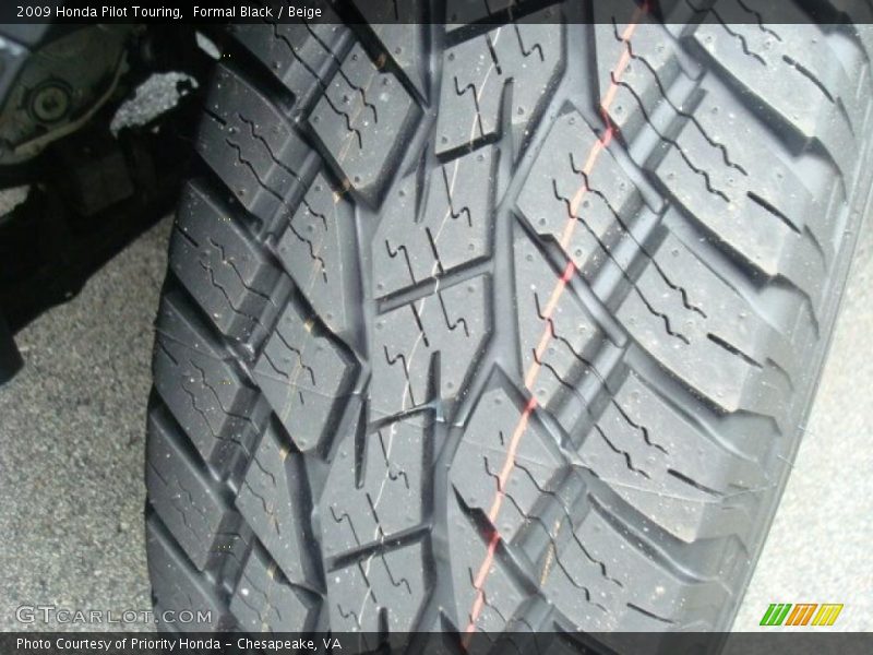 Formal Black / Beige 2009 Honda Pilot Touring