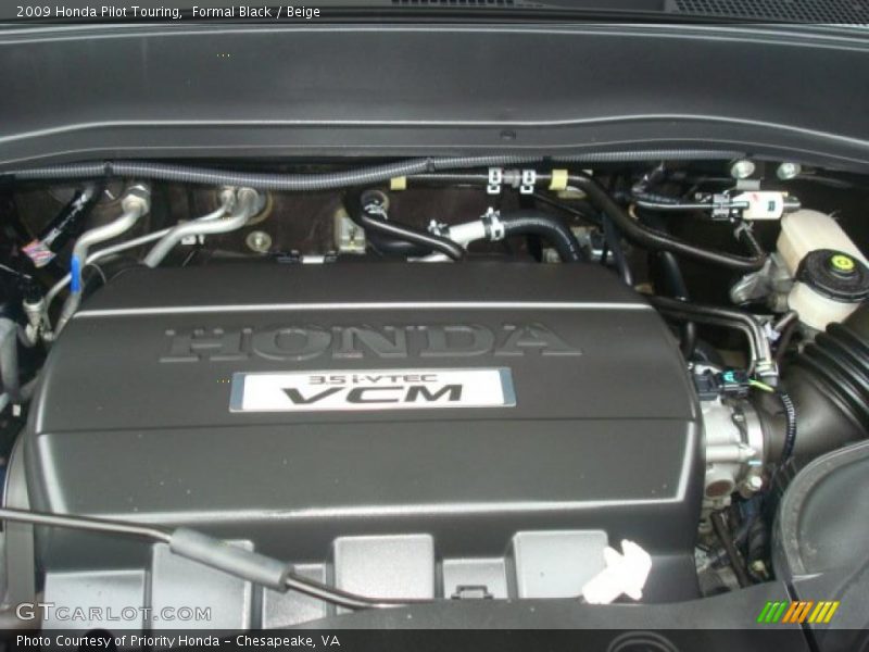 Formal Black / Beige 2009 Honda Pilot Touring