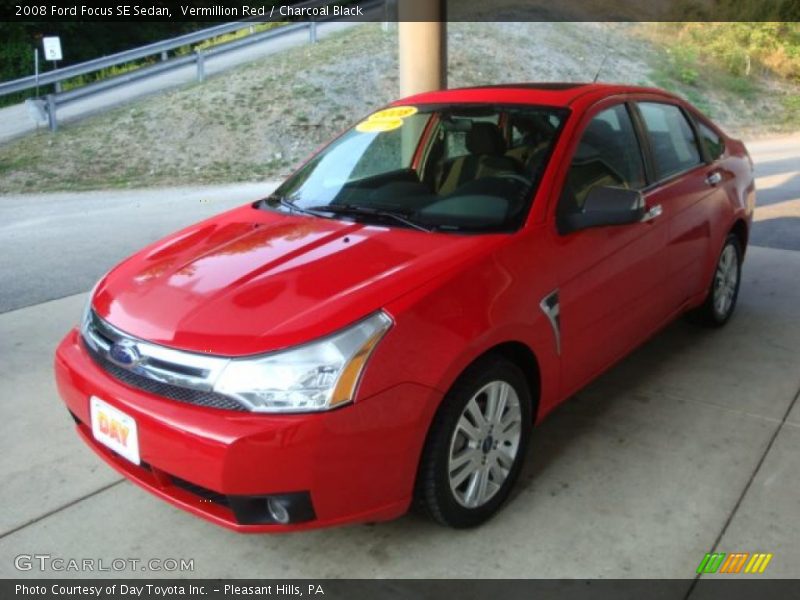 Vermillion Red / Charcoal Black 2008 Ford Focus SE Sedan