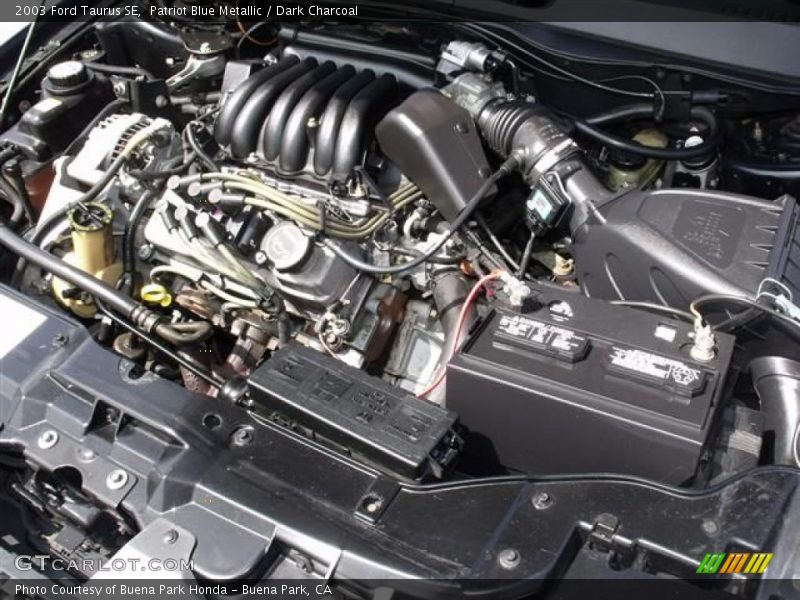 Patriot Blue Metallic / Dark Charcoal 2003 Ford Taurus SE