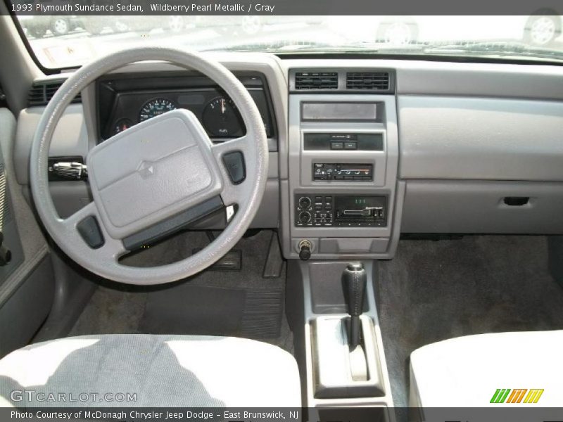 Wildberry Pearl Metallic / Gray 1993 Plymouth Sundance Sedan
