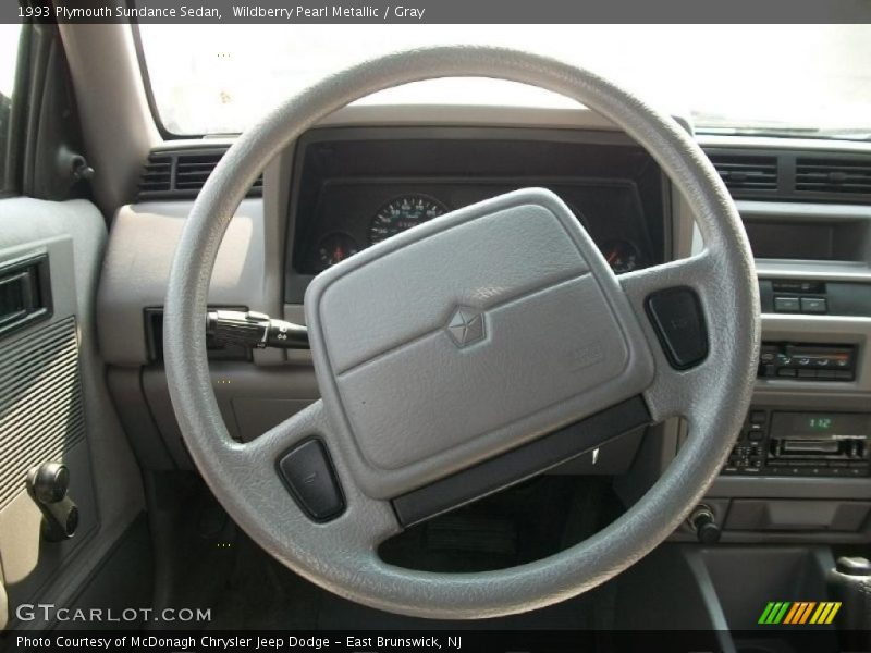 Wildberry Pearl Metallic / Gray 1993 Plymouth Sundance Sedan