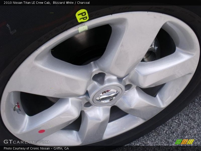 Blizzard White / Charcoal 2010 Nissan Titan LE Crew Cab