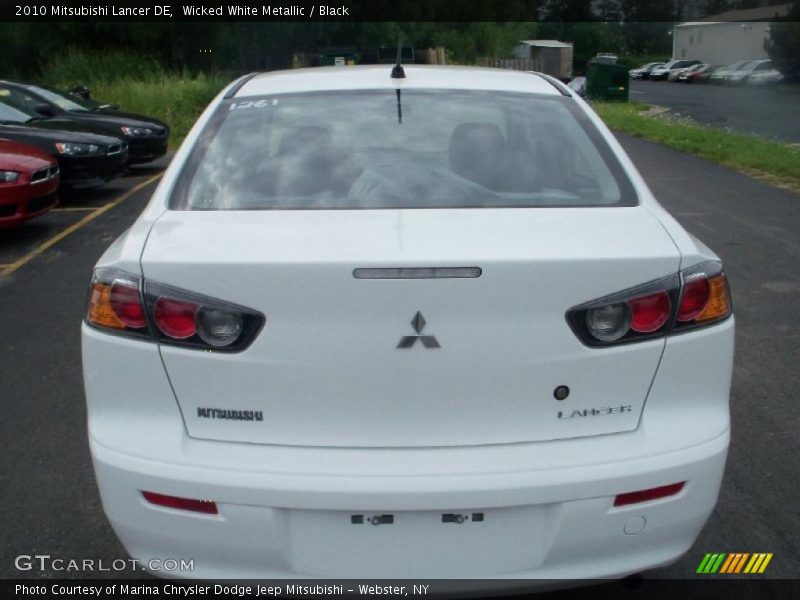 Wicked White Metallic / Black 2010 Mitsubishi Lancer DE