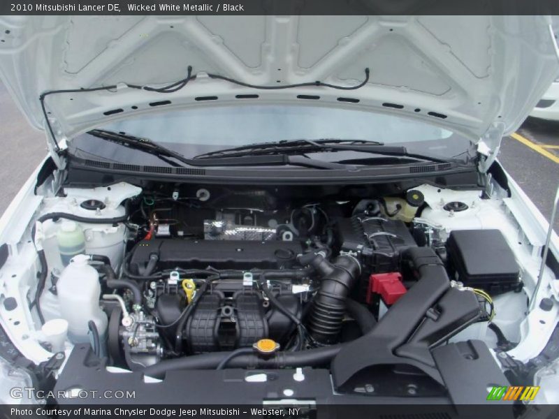 Wicked White Metallic / Black 2010 Mitsubishi Lancer DE