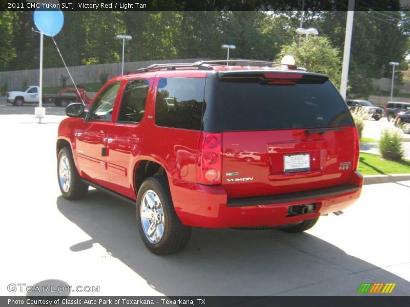 Victory Red / Light Tan 2011 GMC Yukon SLT