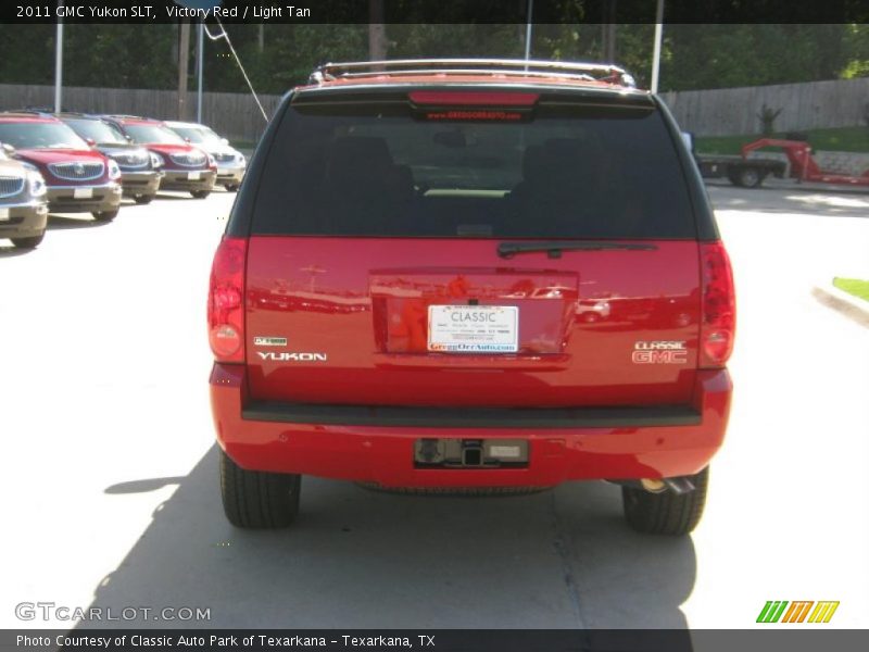 Victory Red / Light Tan 2011 GMC Yukon SLT